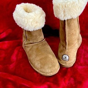 Worn once, fur folds down or up